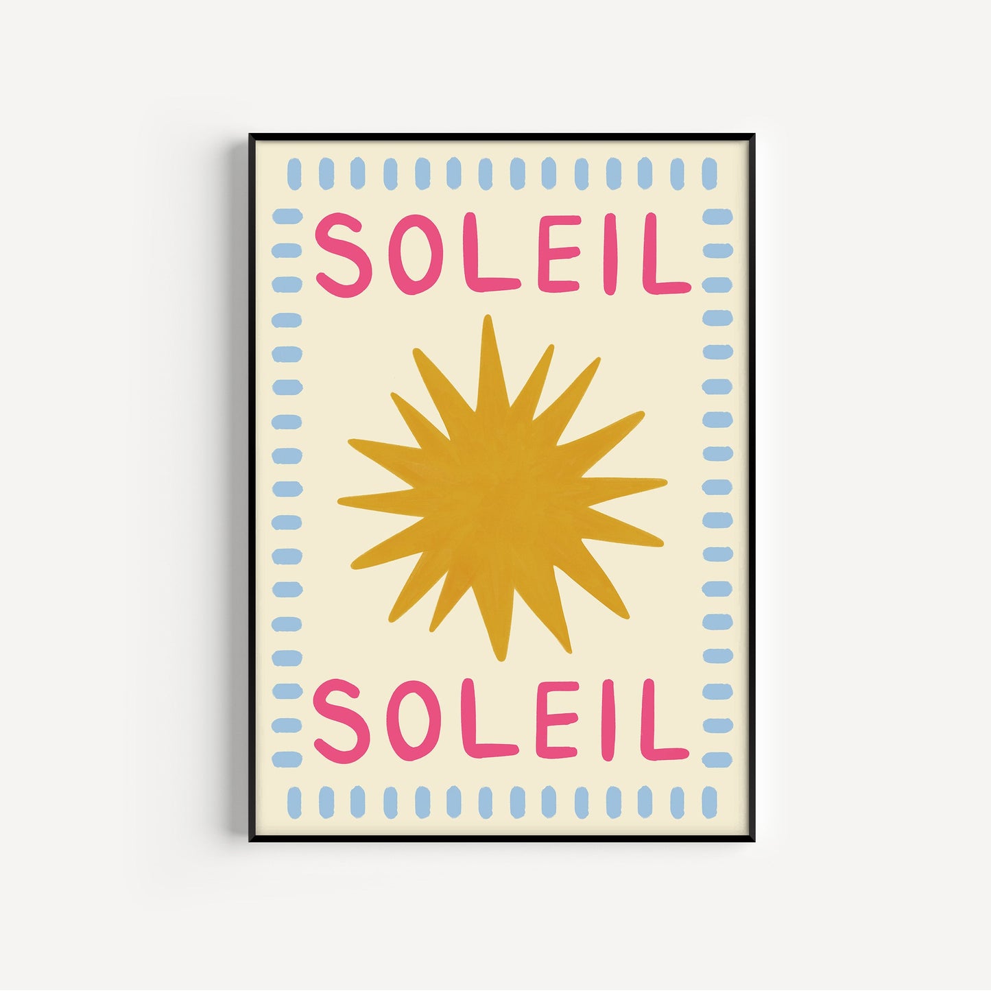 Framed artwork with 'Soleil' text and sun design on a beige background