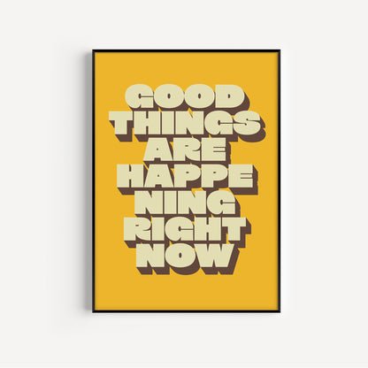 Framed poster with 'Good things are happening right now' text on a yellow background