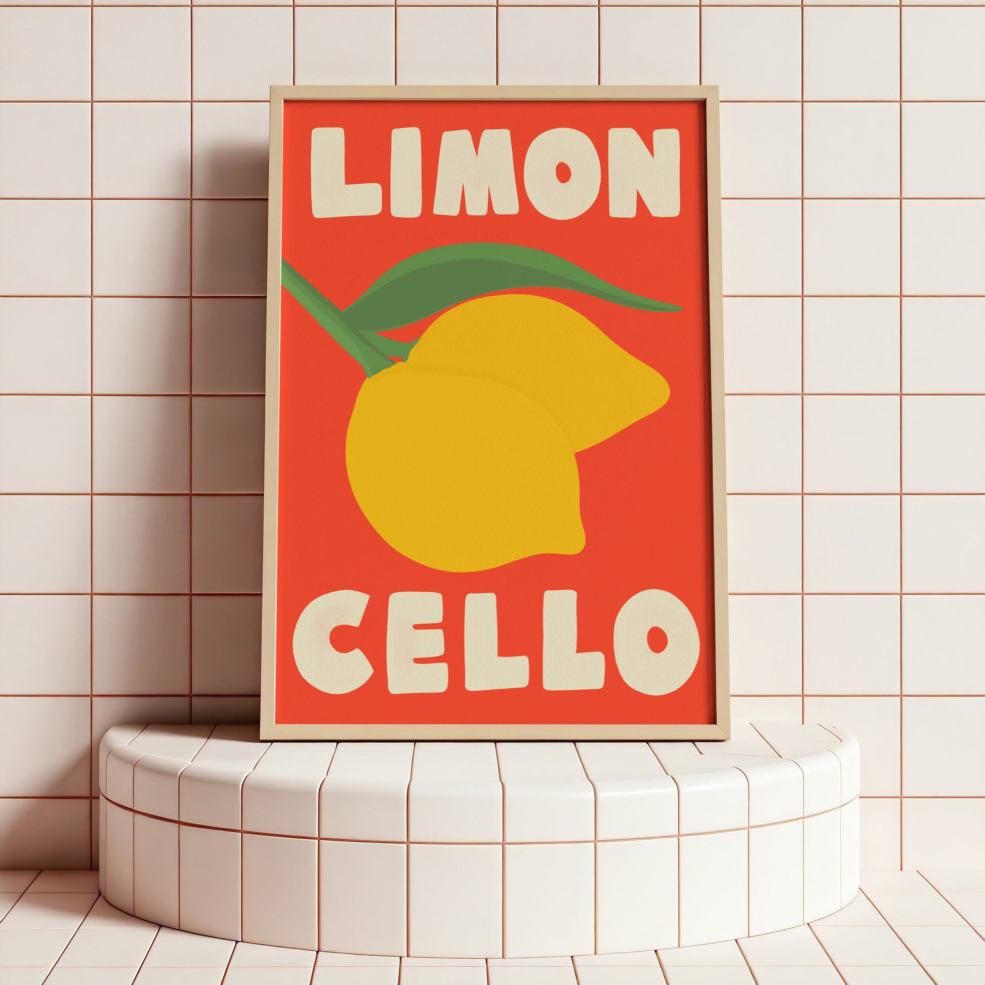 Framed artwork with a lemon illustration and text on a tiled wall.