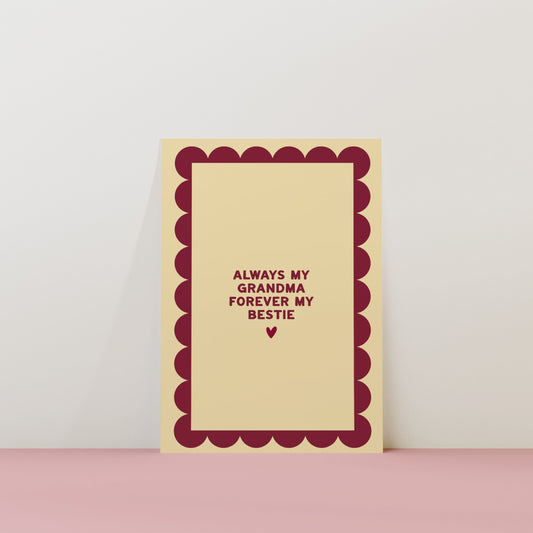 Card with text 'Always my grandma, forever my bestie' on a pink surface and light gray background