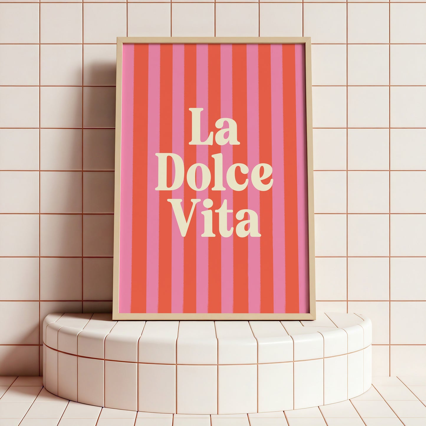 Framed 'La Dolce Vita' poster on a tiled wall