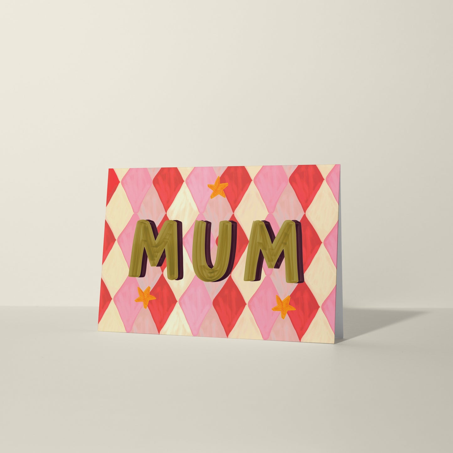 Card with 'MUM' text on a geometric patterned background
