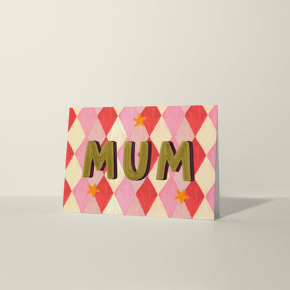 Card with 'MUM' text on a geometric patterned background