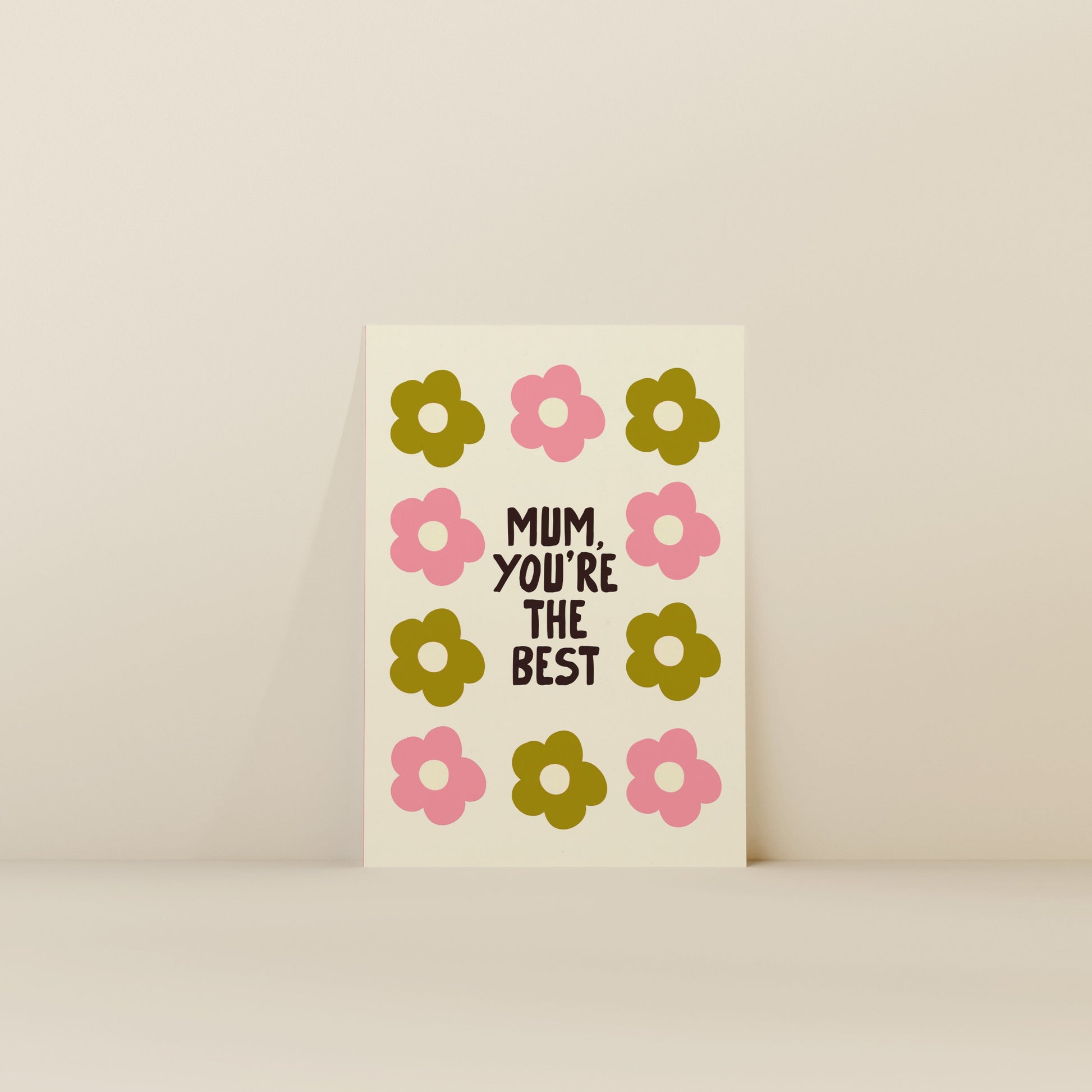 Card with floral design and text 'Mum, you're the best' on a beige background
