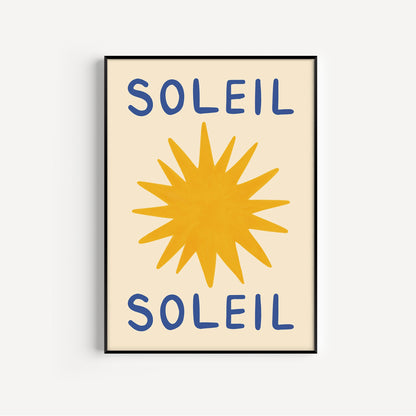Framed artwork with a yellow sun and blue text spelling 'Soleil' on a beige background